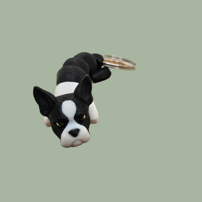 Black and white articulated dog keyring with pointed ears, Boston Terrier/French Bulldog style